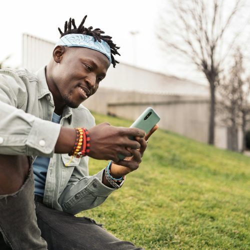 Black Boy Using Phone